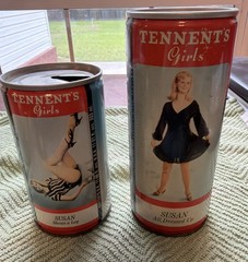TENNENT’S GIRL SUSAN shows a leg Straight Steel Beer can from 333ml) set of 2