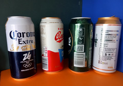 x 4 EMPTY BEER CANS BUDWAR, MYTHOS, MARTINEZ, CORONA EXTRA MILANO CORTINA 2026