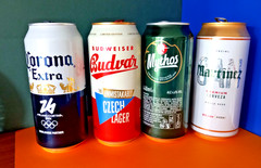 x 4 EMPTY BEER CANS BUDWAR, MYTHOS, MARTINEZ, CORONA EXTRA MILANO CORTINA 2026