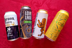 x 4 EMPTY BEER CANS CORONA MILANO CORTINA OLYMPIC, LOVE LANE, COBRA, MODELO